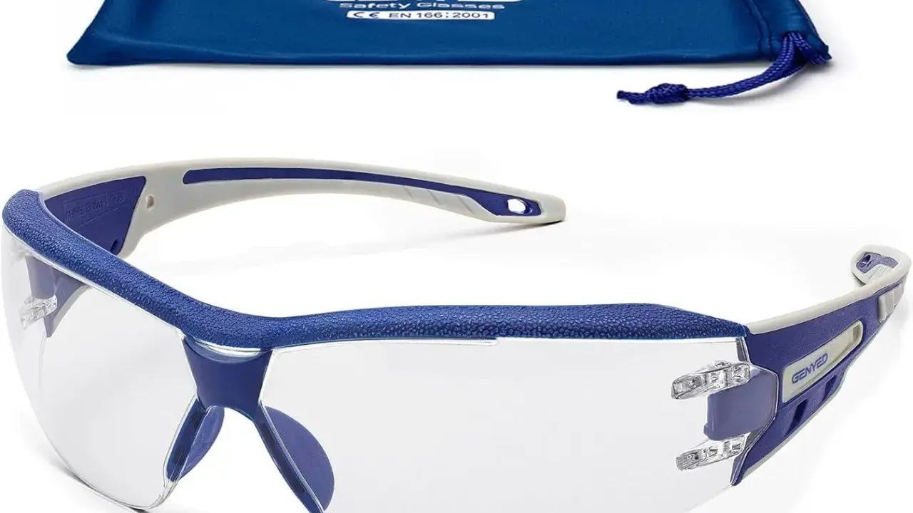 Gafas de seguridad transparentes con montura azul y gris, cumplen la norma EN 166. Incluyen bolsa de tela azul.